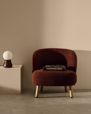 Ulit armchair in terracotta bouclé with solid beech wood legs in a natural finish