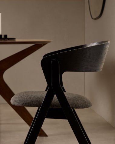 Godia chair made of ash veneer and solid rubber wood with a black finish and grey chenille