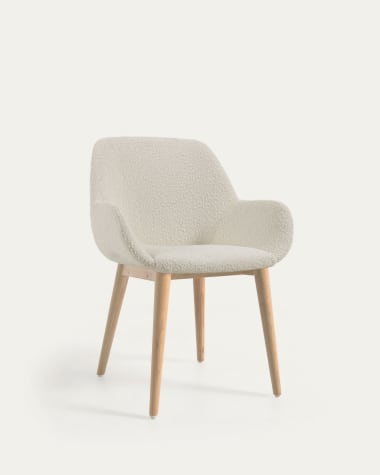 Konna chair in white bouclé with solid ash wood legs in a natural finish