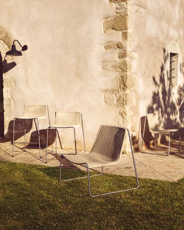 Tavari stackable armchair in beige synthetic rope cord and AISI 304 stainless steel with brushed finish