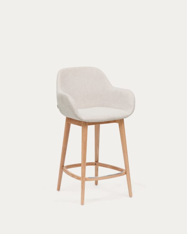 Konna stool in beige and solid ash wood legs in a light finish, 65 cm