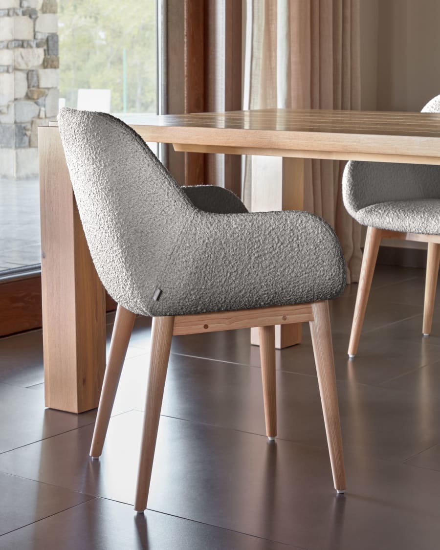 Konna chair in grey bouclé with solid ash wood legs in a natural finish