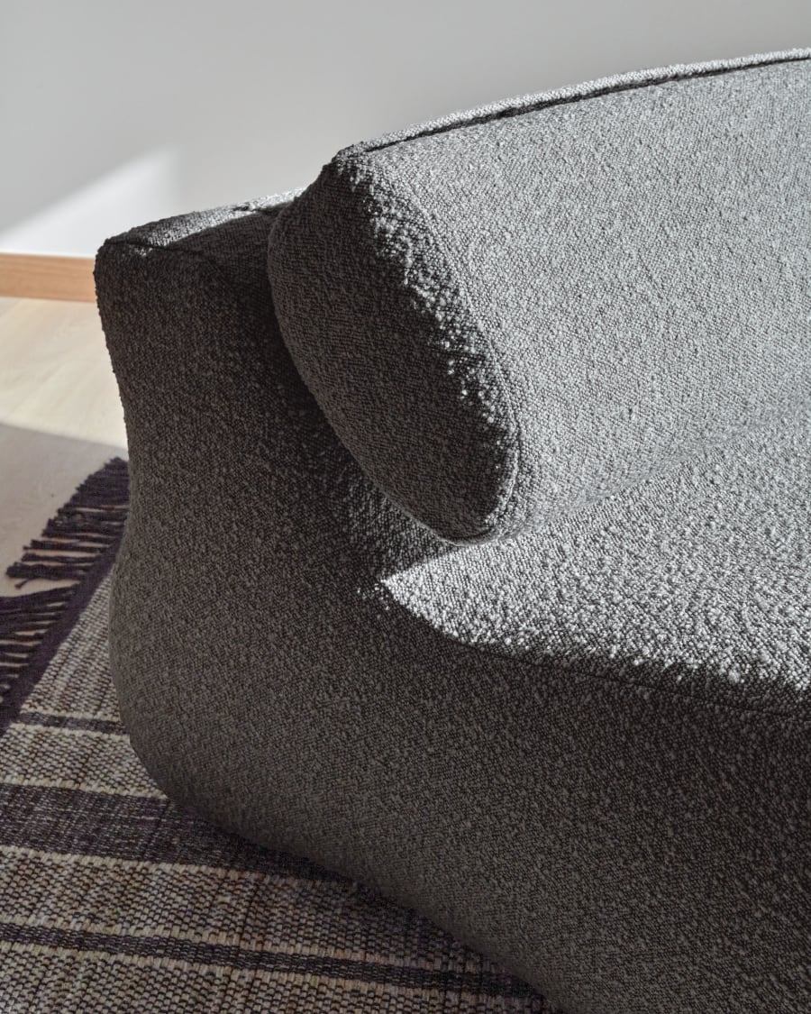 Club armchair in black bouclé