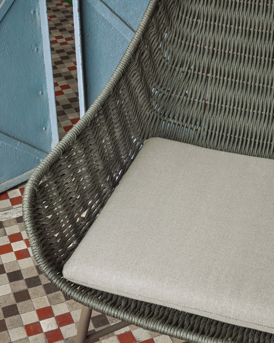 Abeli green cord armchair with galvanised steel legs.