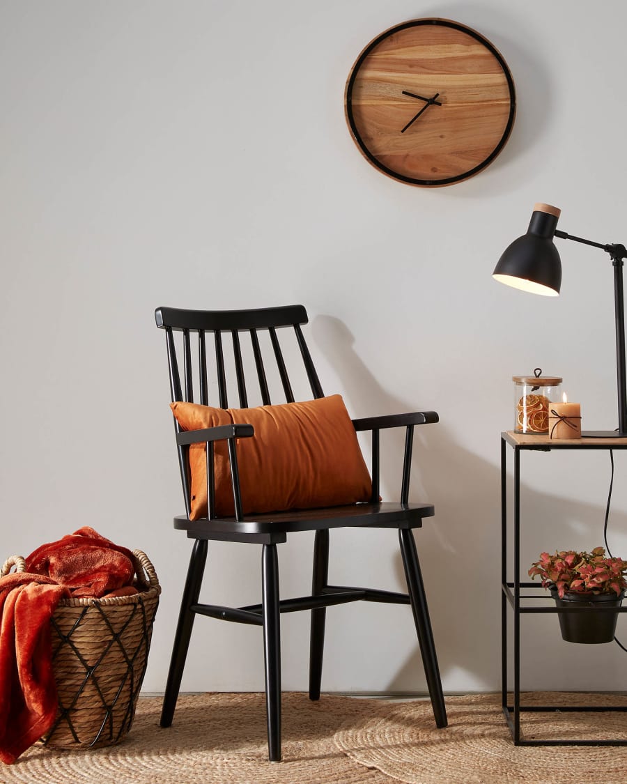 Black Tressia chair with armrests