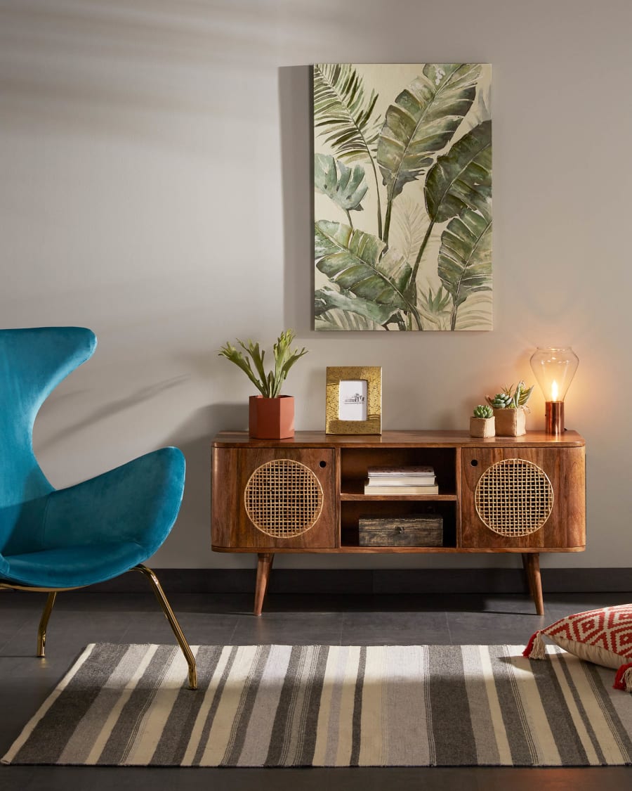 Chleo armchair in turquoise with legs in a gold finish