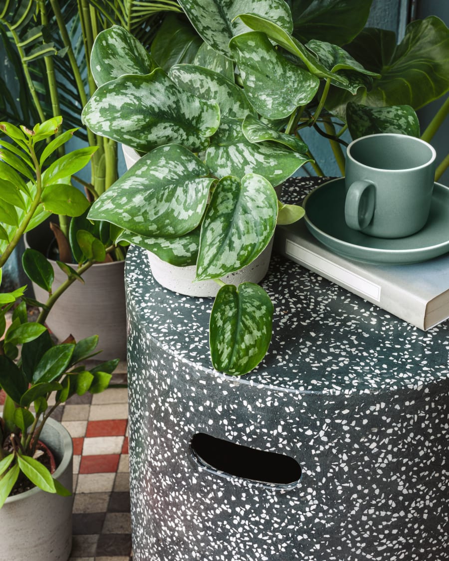 Jenell outdoor terrazzo footrest in black, Ø 35 cm