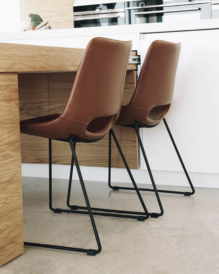 Zahara synthetic leather brown chair with steel legs with black finish