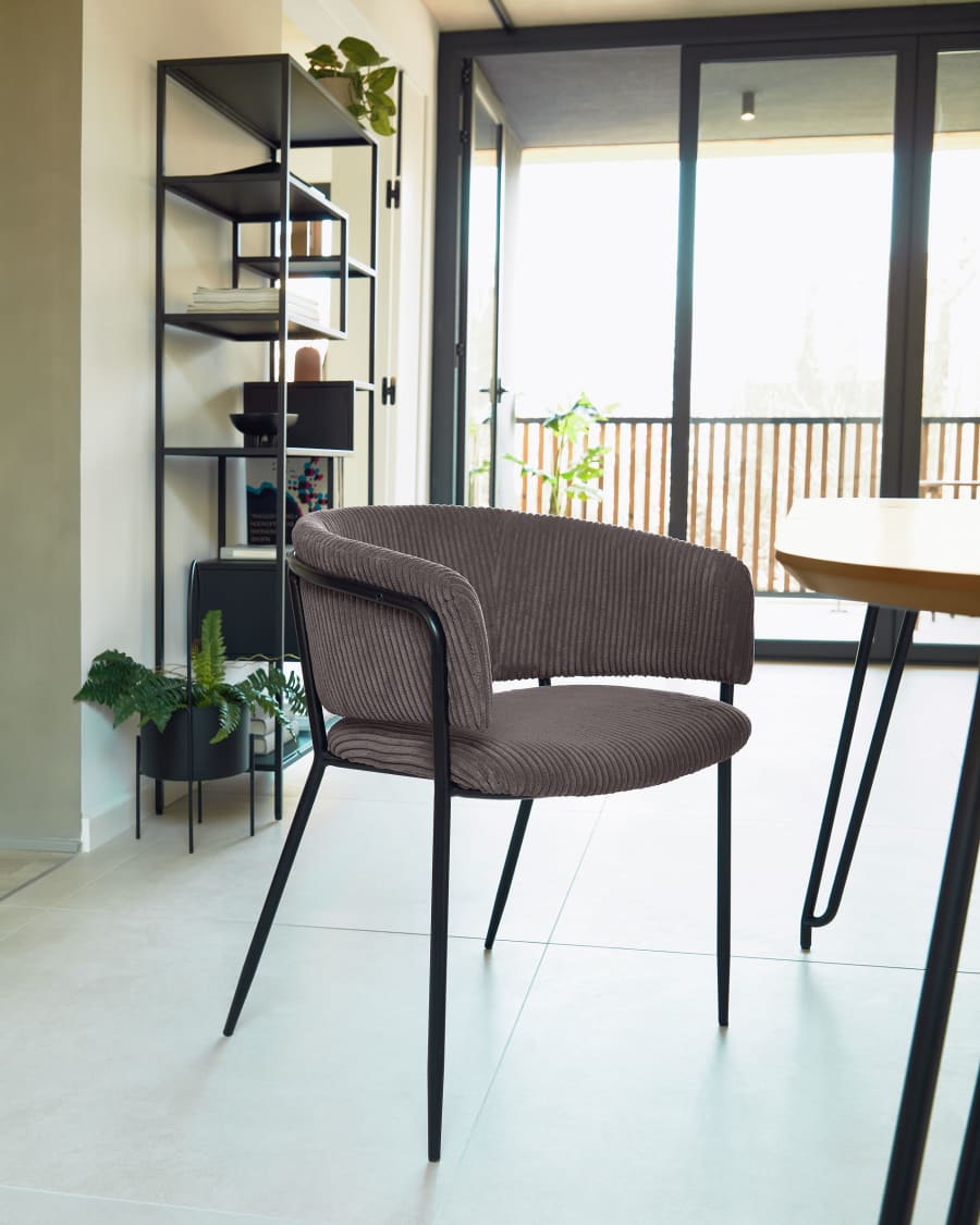 Runnie chair made from grey wide seam corduroy with steel legs in a black finish