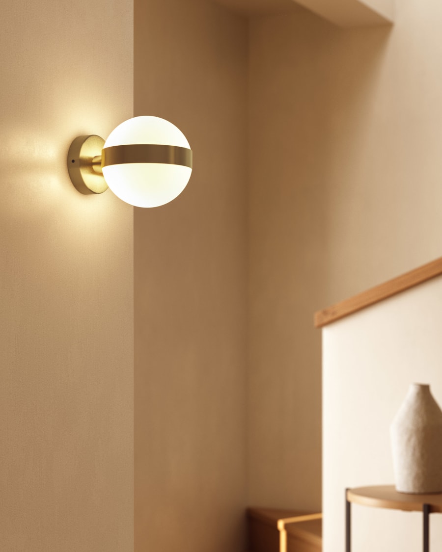 Anasol metal wall sconce with gold finish