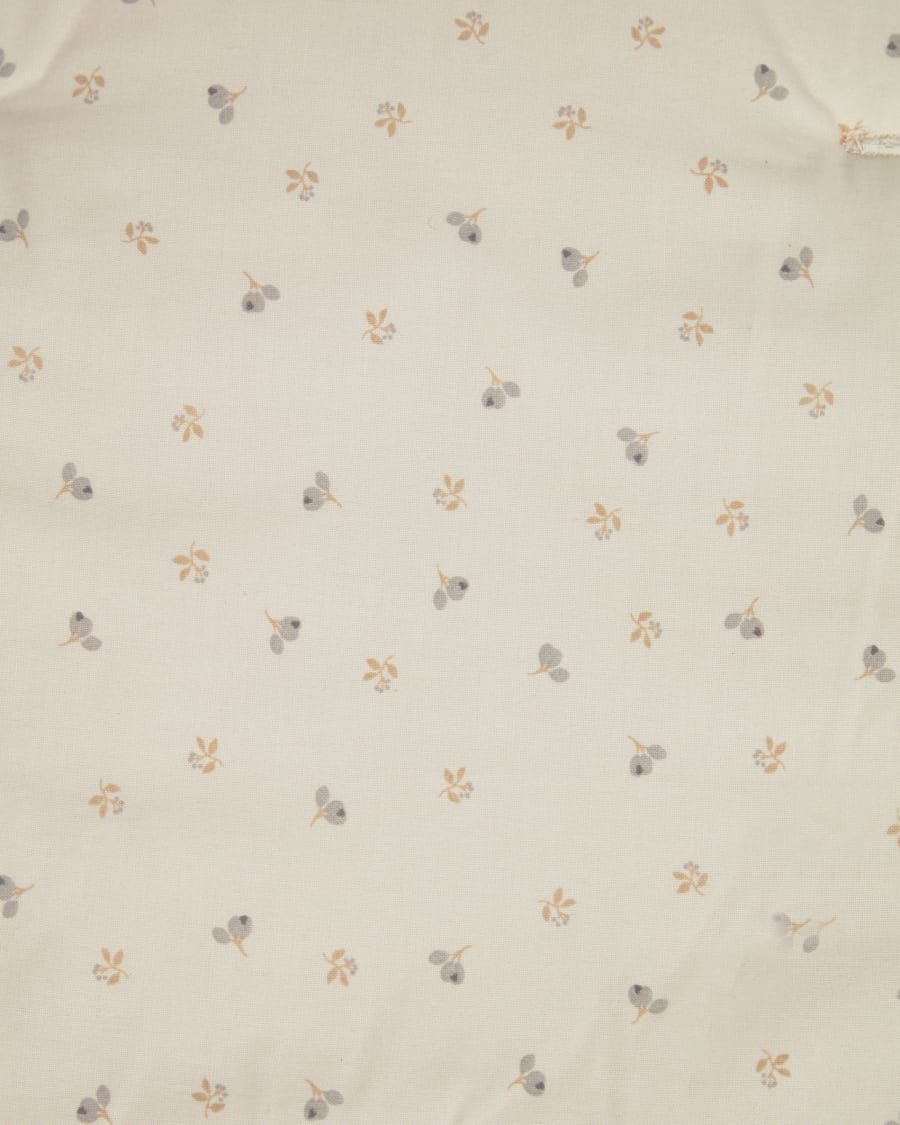 Yamile highchair cushion 100% organic cotton (GOTS) in beige with multicoloured leaves