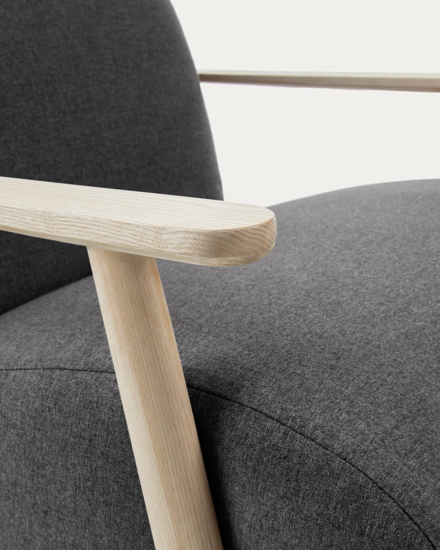 Meghan armchair in black with solid ash wood legs in a natural finish