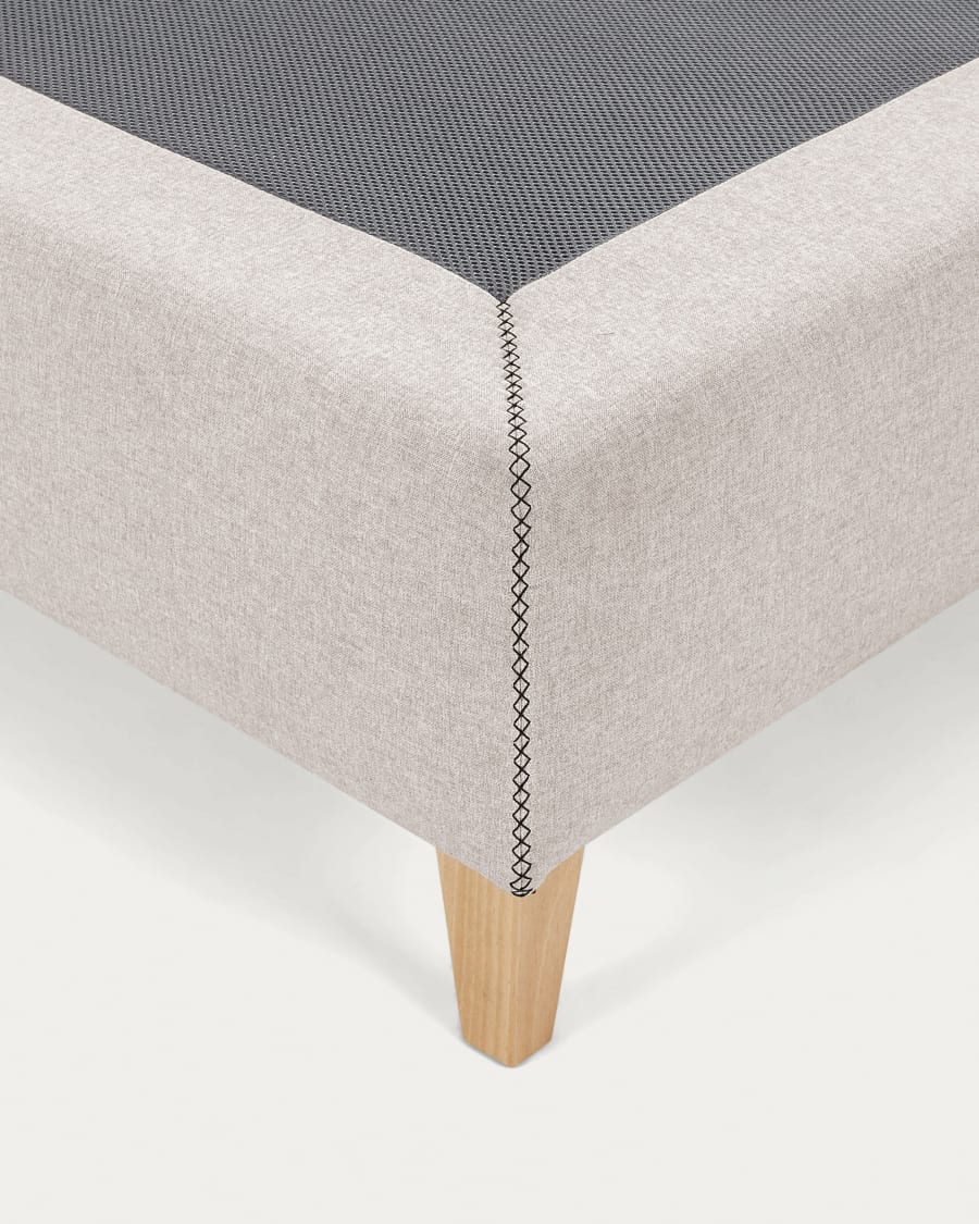 Nikos tall bed base in beige with solid beech wood legs for a 150 x 190 cm mattress