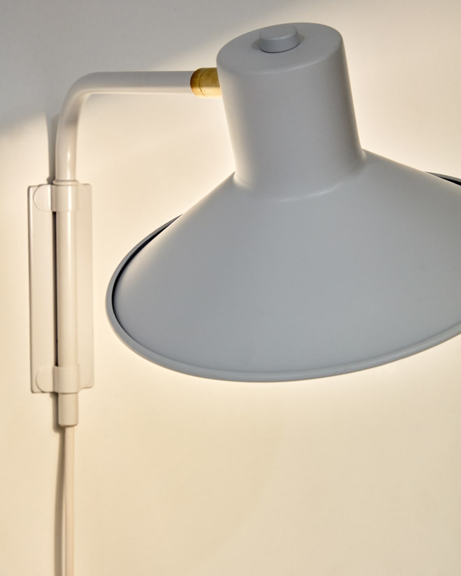 Aria small steel wall light with white finish. UK adapter