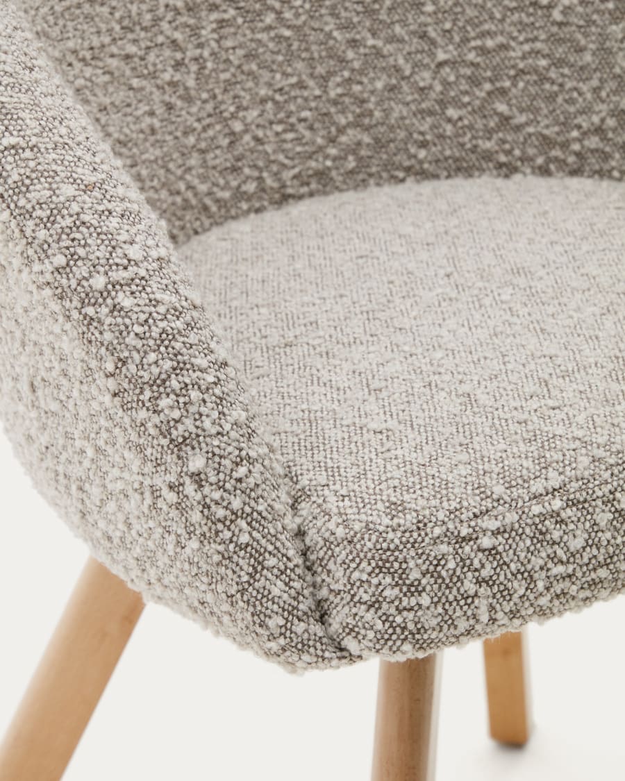 Marvin swivel chair with grey bouclé and beech wood legs in a natural finish FSC 100%