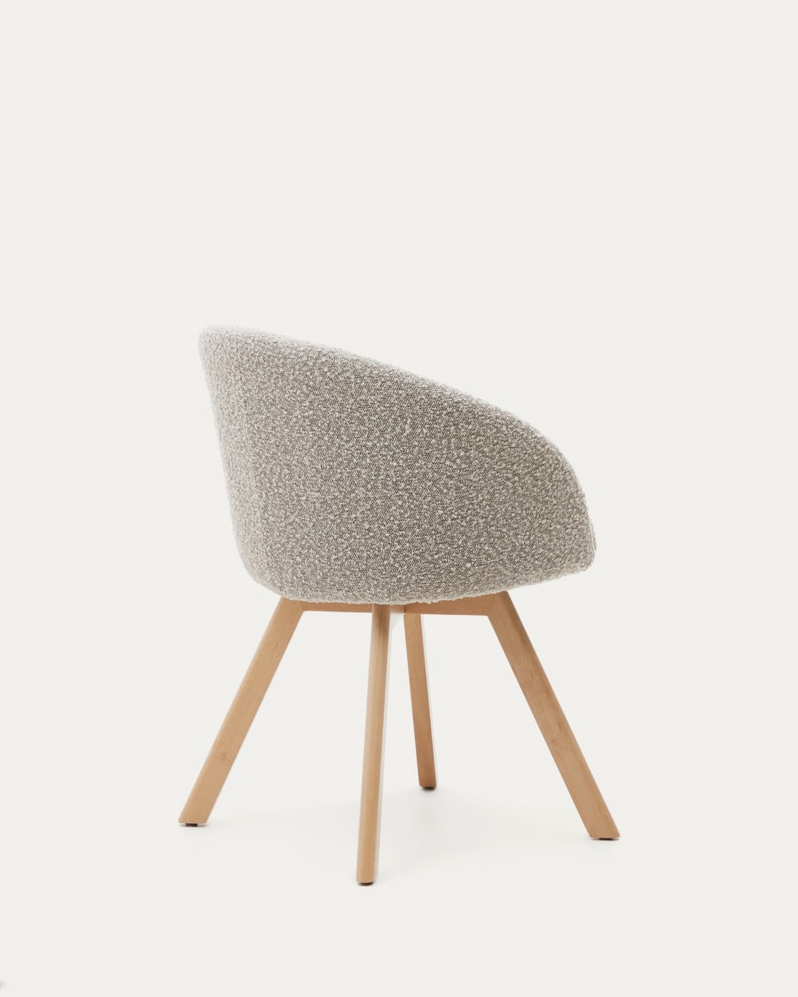 Marvin swivel chair with grey bouclé and beech wood legs in a natural finish FSC 100%