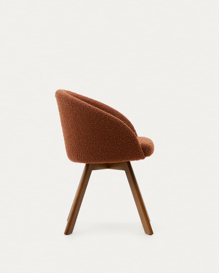 Marvin brown bouclé swivel chair with solid beech wood legs in a walnut finish