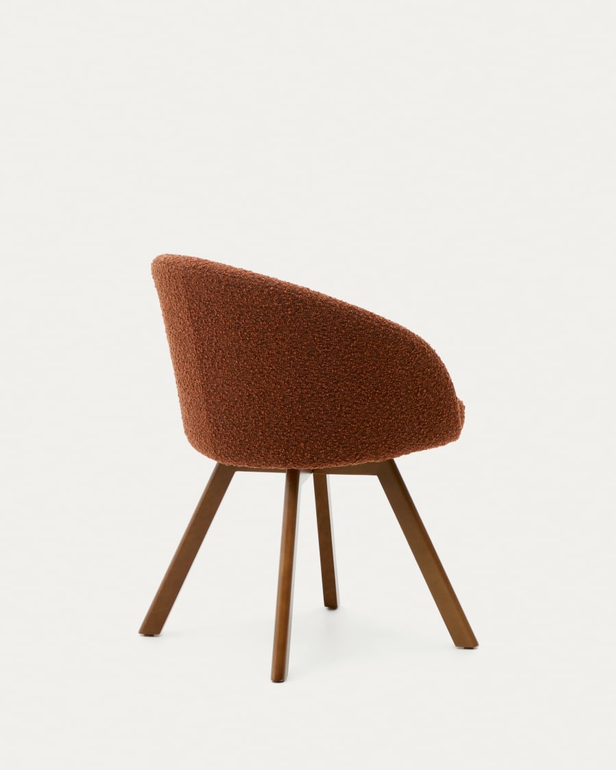 Marvin brown bouclé swivel chair with solid beech wood legs in a walnut finish