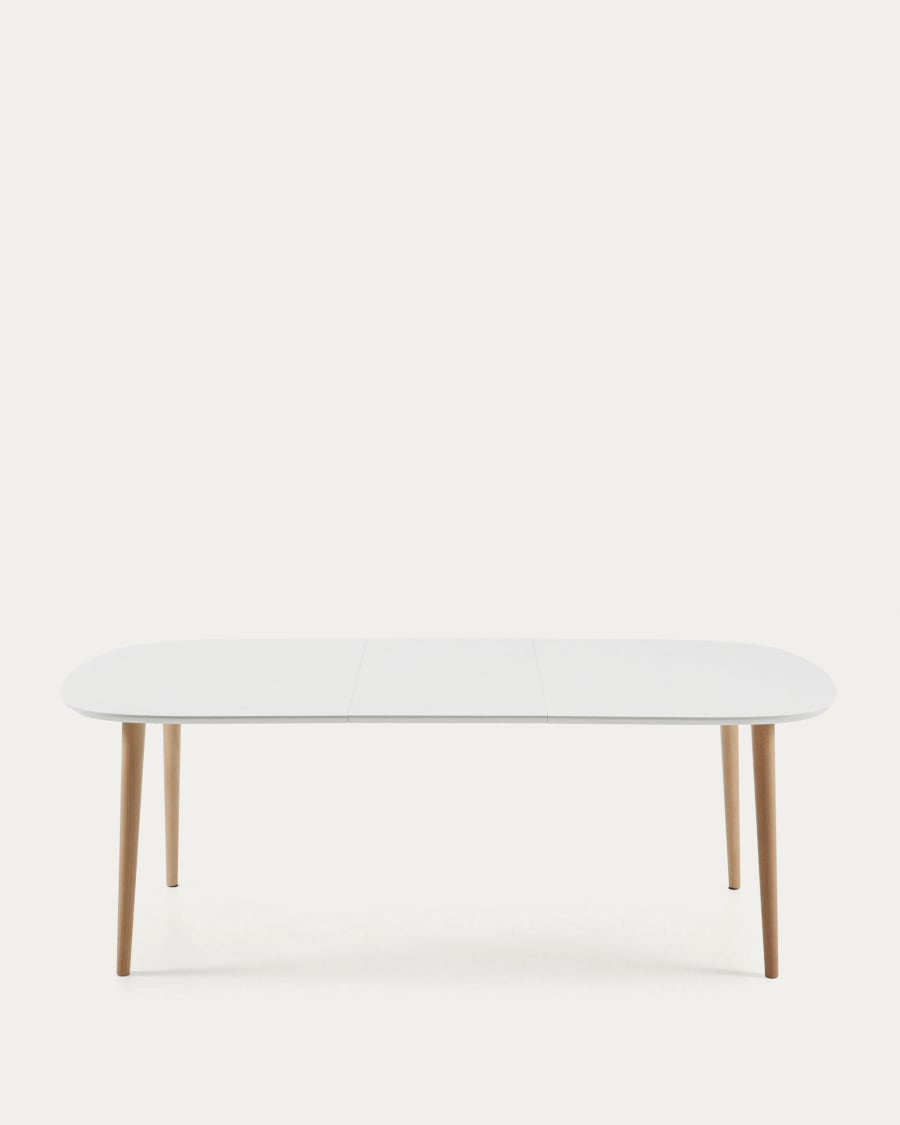 Oqui extendable oval table with an oak veneer and solid wood legs, Ø 160 (260) x 100 cm