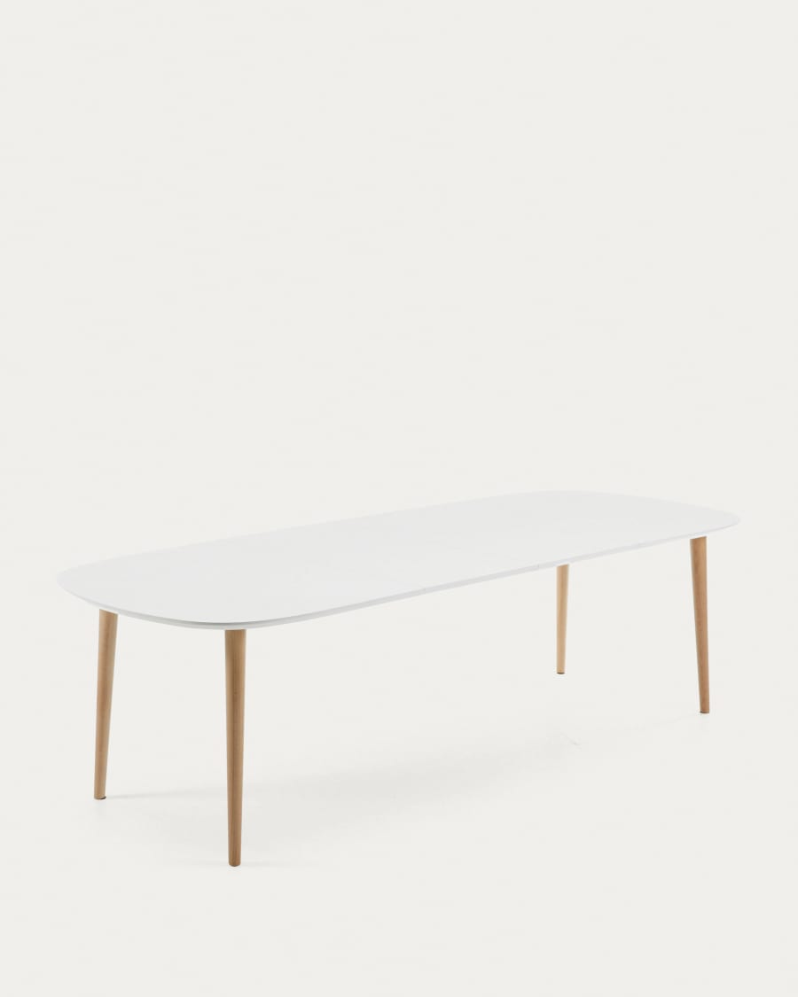 Oqui extendable oval table with an oak veneer and solid wood legs, Ø 160 (260) x 100 cm