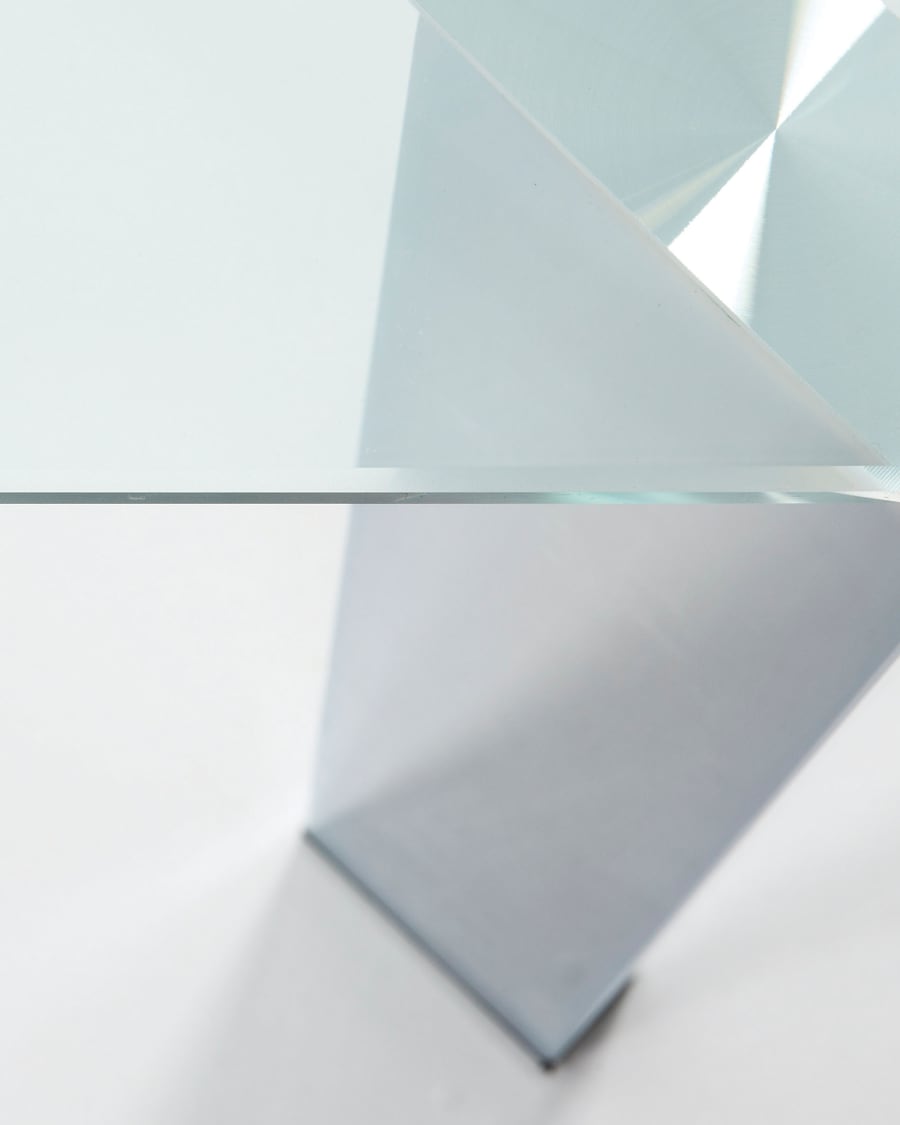 Spot glass table with steel legs and chrome finish 142 x 92 cm