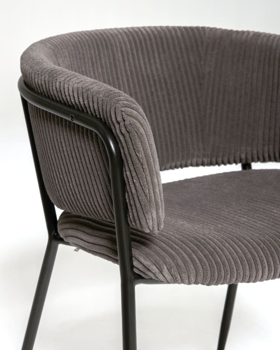 Runnie chair made from grey wide seam corduroy with steel legs in a black finish