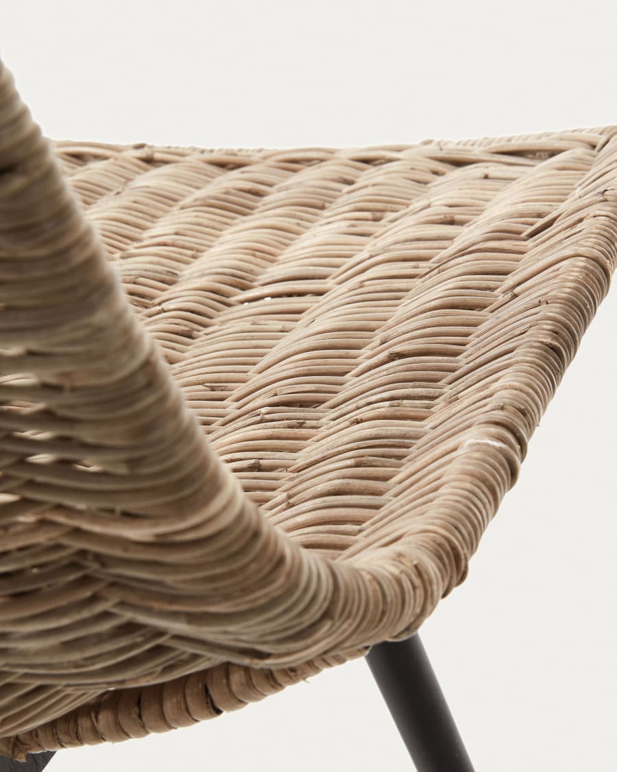 Equal chair made from rattan, with black finished steel legs
