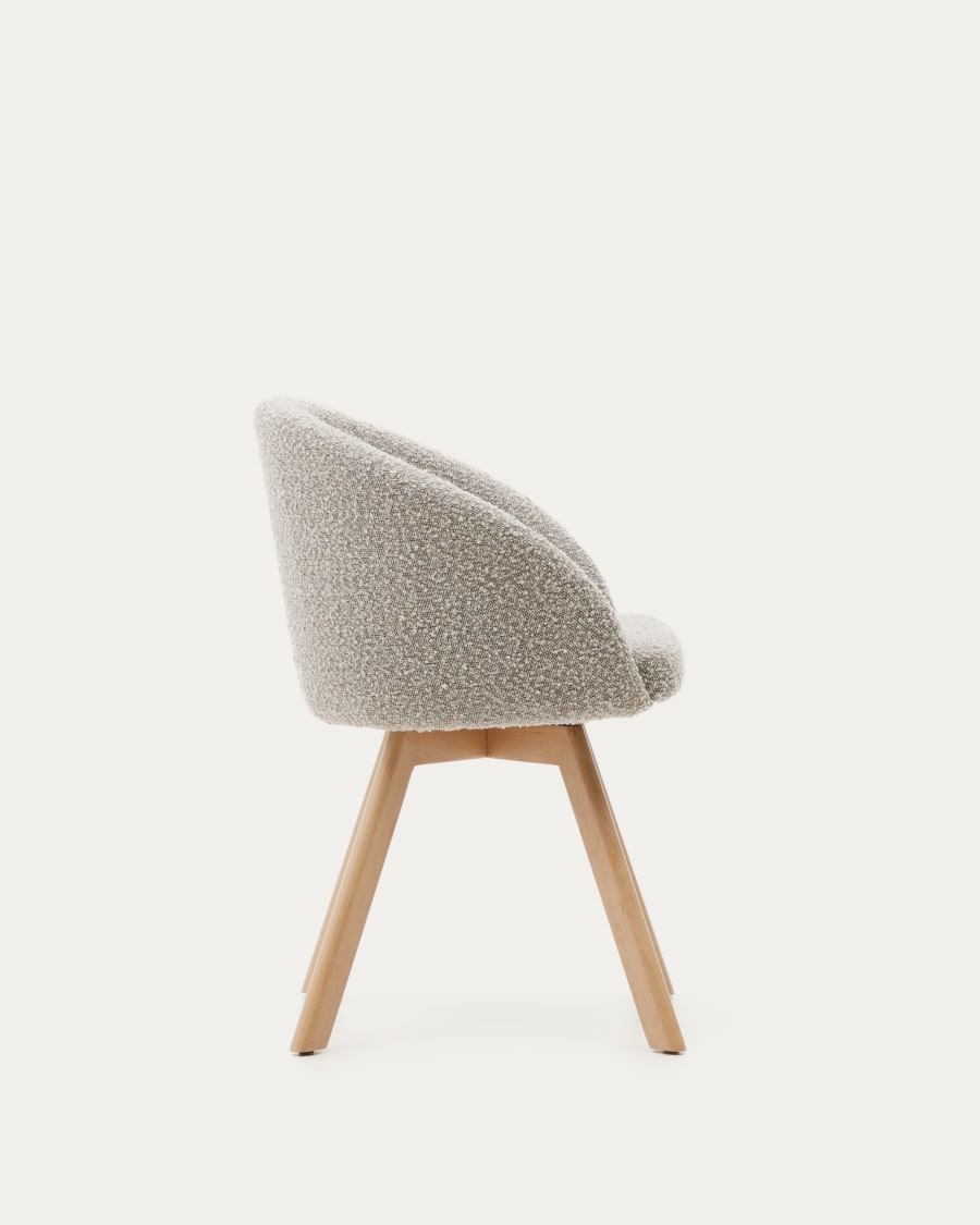 Marvin swivel chair with grey bouclé and beech wood legs in a natural finish FSC 100%