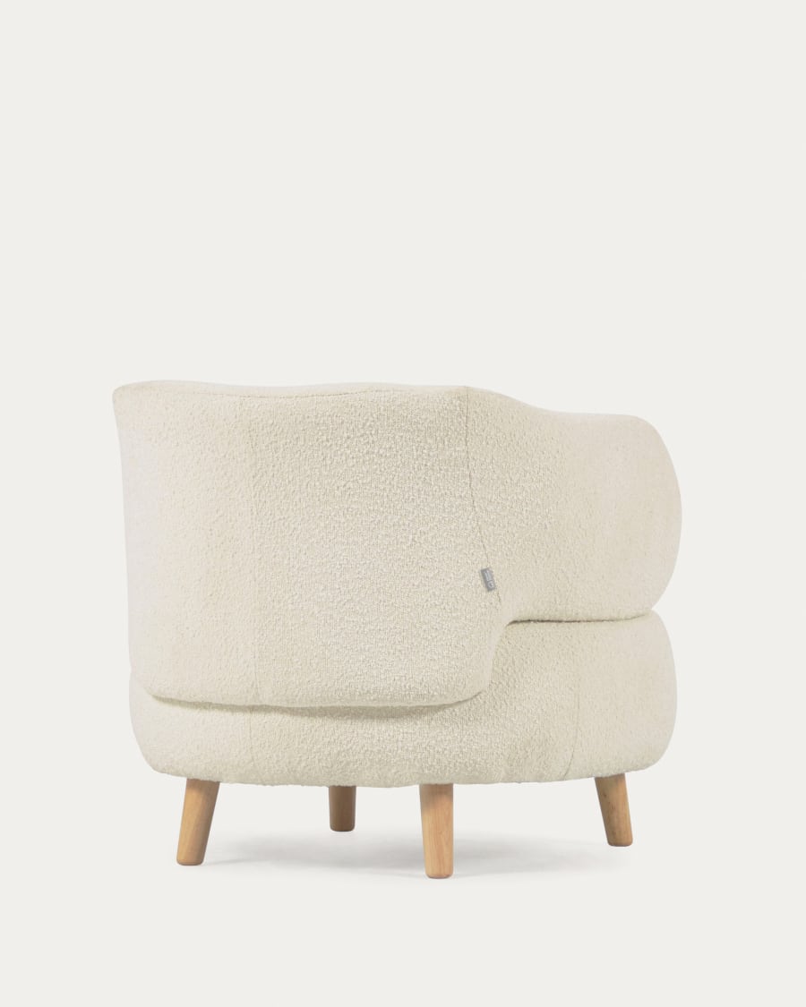 Luisa white bouclé armchair with solid rubber wood legs.