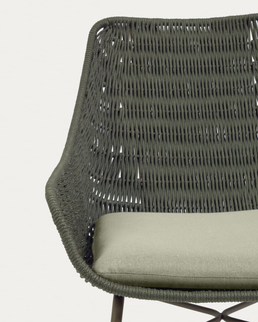 Abeli green cord armchair with galvanised steel legs.