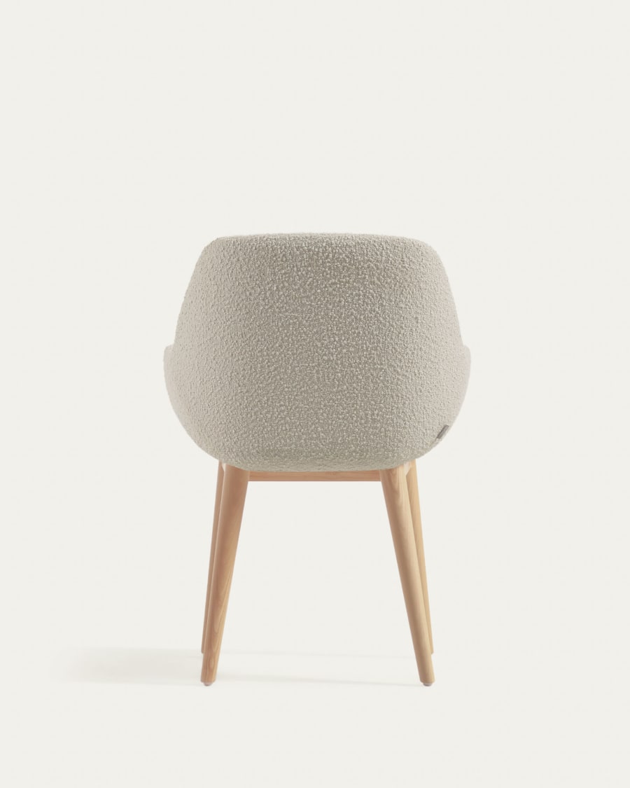 Konna chair in white bouclé with solid ash wood legs in a natural finish