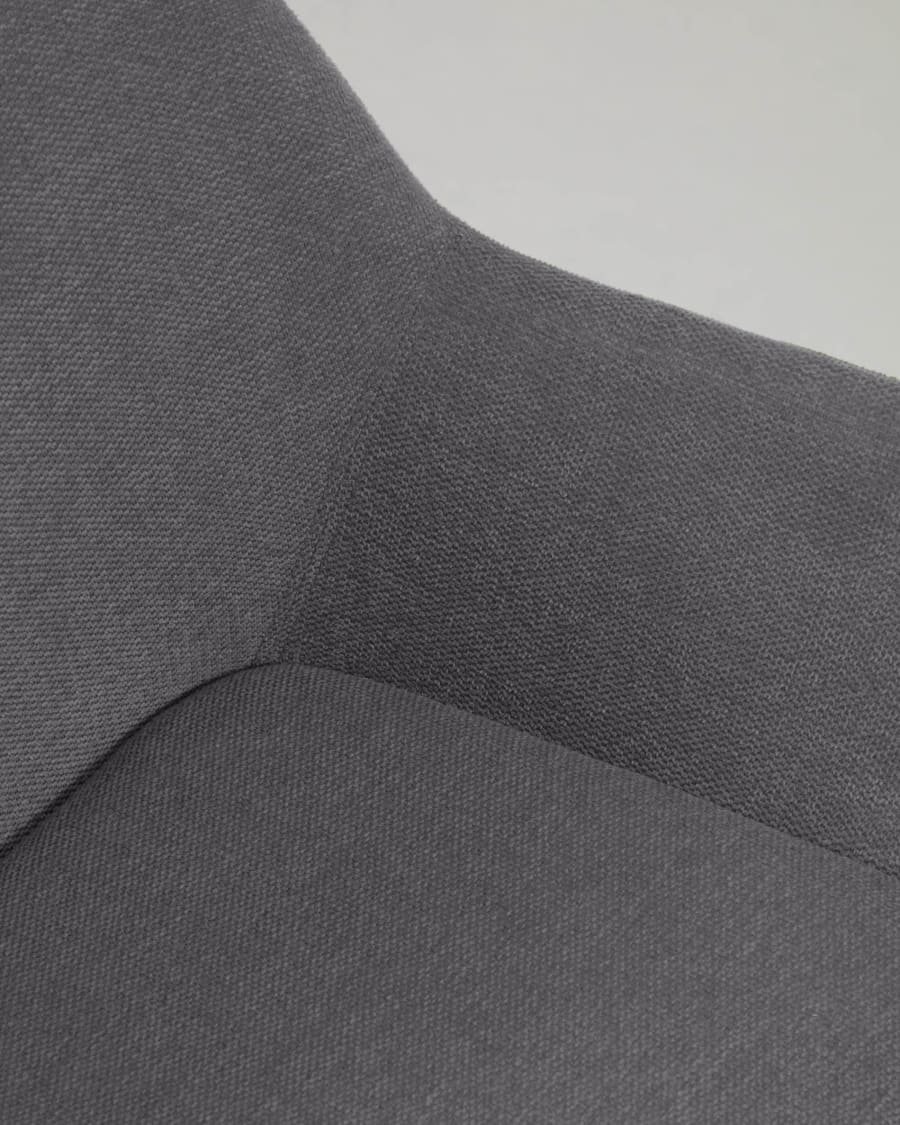 Konna chair in dark grey with solid ash wood legs in a dark finish