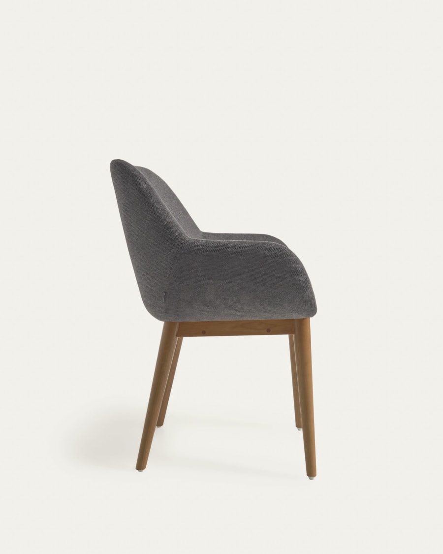 Konna chair in dark grey with solid ash wood legs in a dark finish