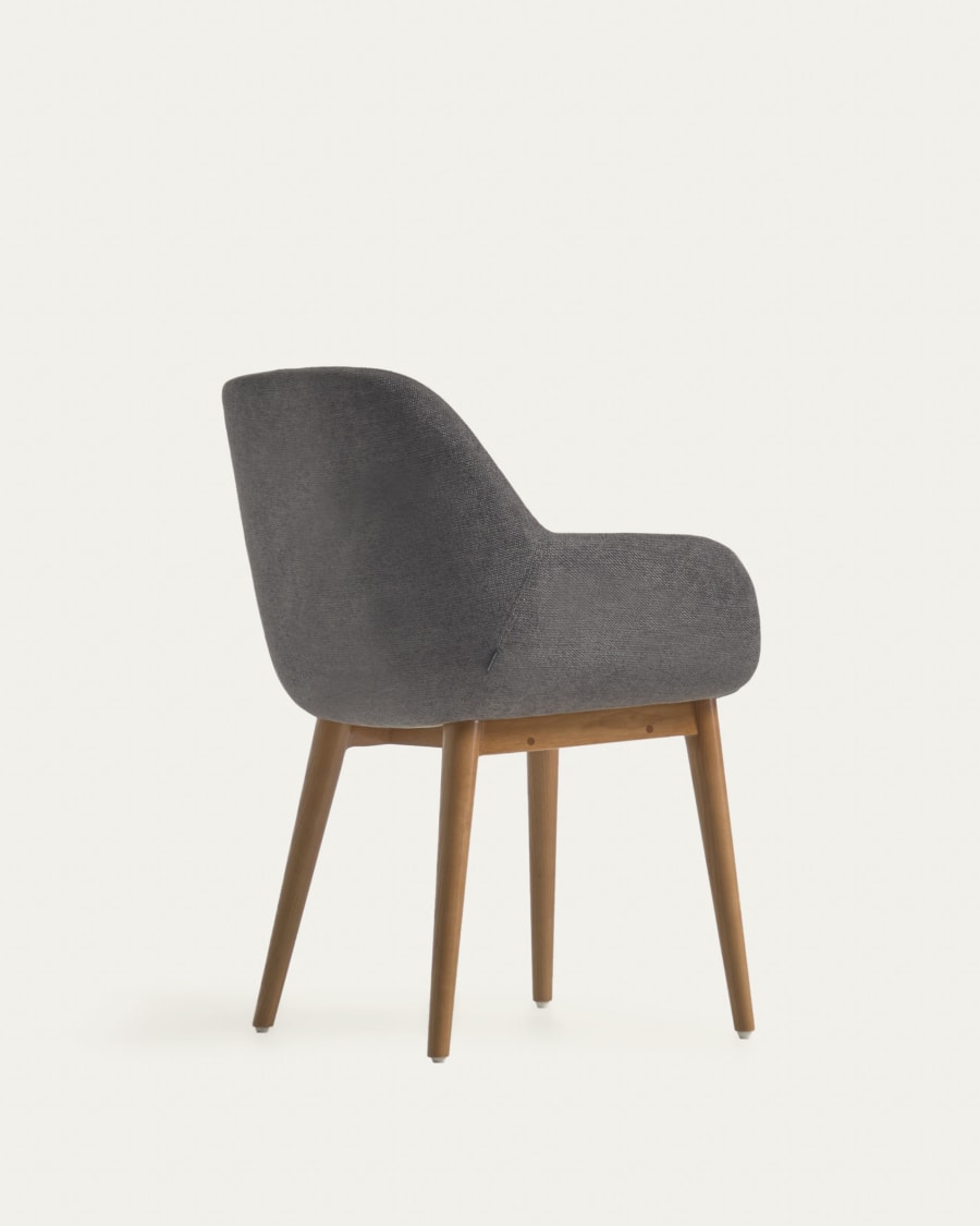 Konna chair in dark grey with solid ash wood legs in a dark finish