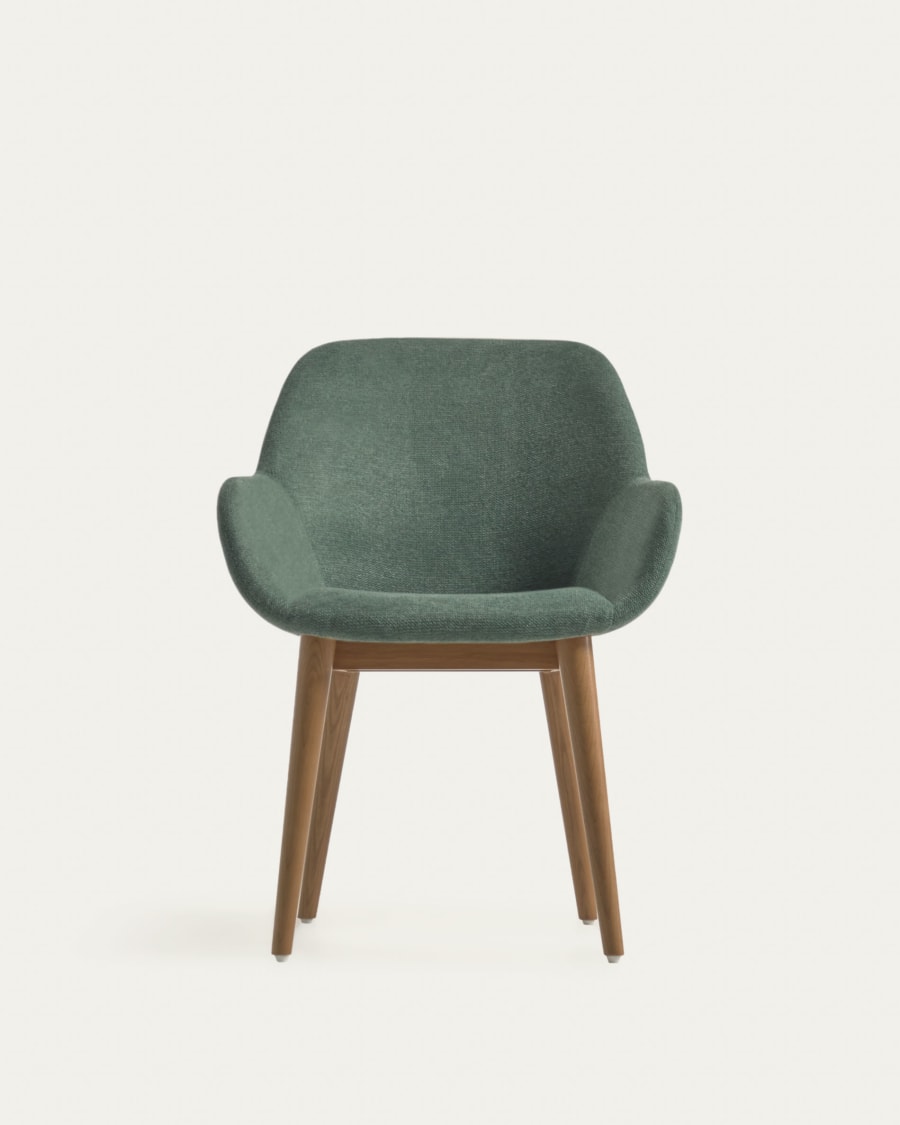 Konna chair in green with solid ash wood legs in a dark finish