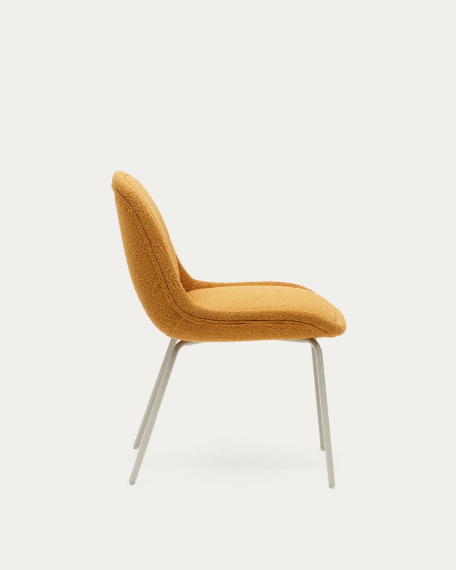 Aimin chair in mustard bouclé and steel legs with a matte beige painted finish FSC Mix Credit