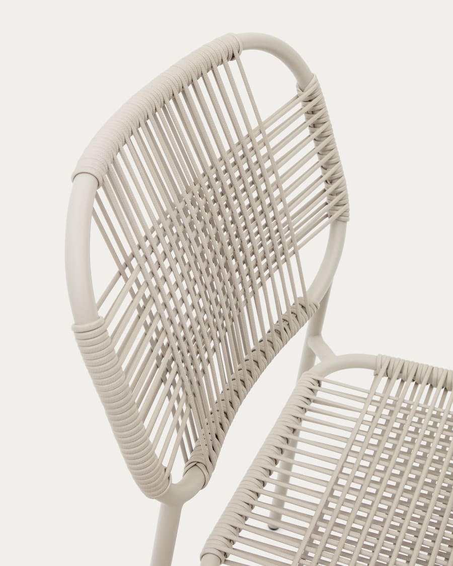 Talaier stackable outdoor chair  made of synthetic rope and galvanized steel in beige finish