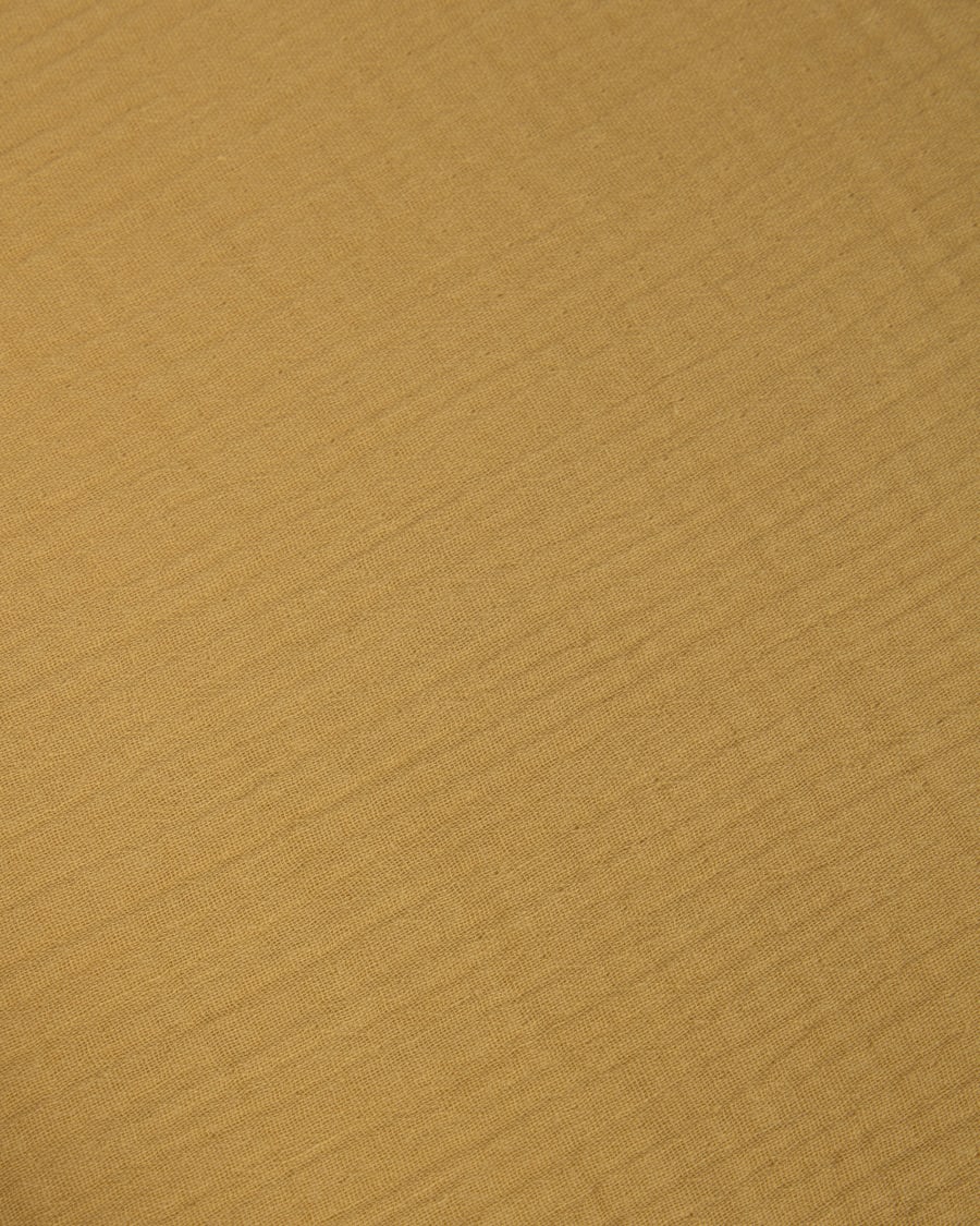 Yamile crib protector 100% organic cotton (GOTS) in mustard 180 x 30 cm