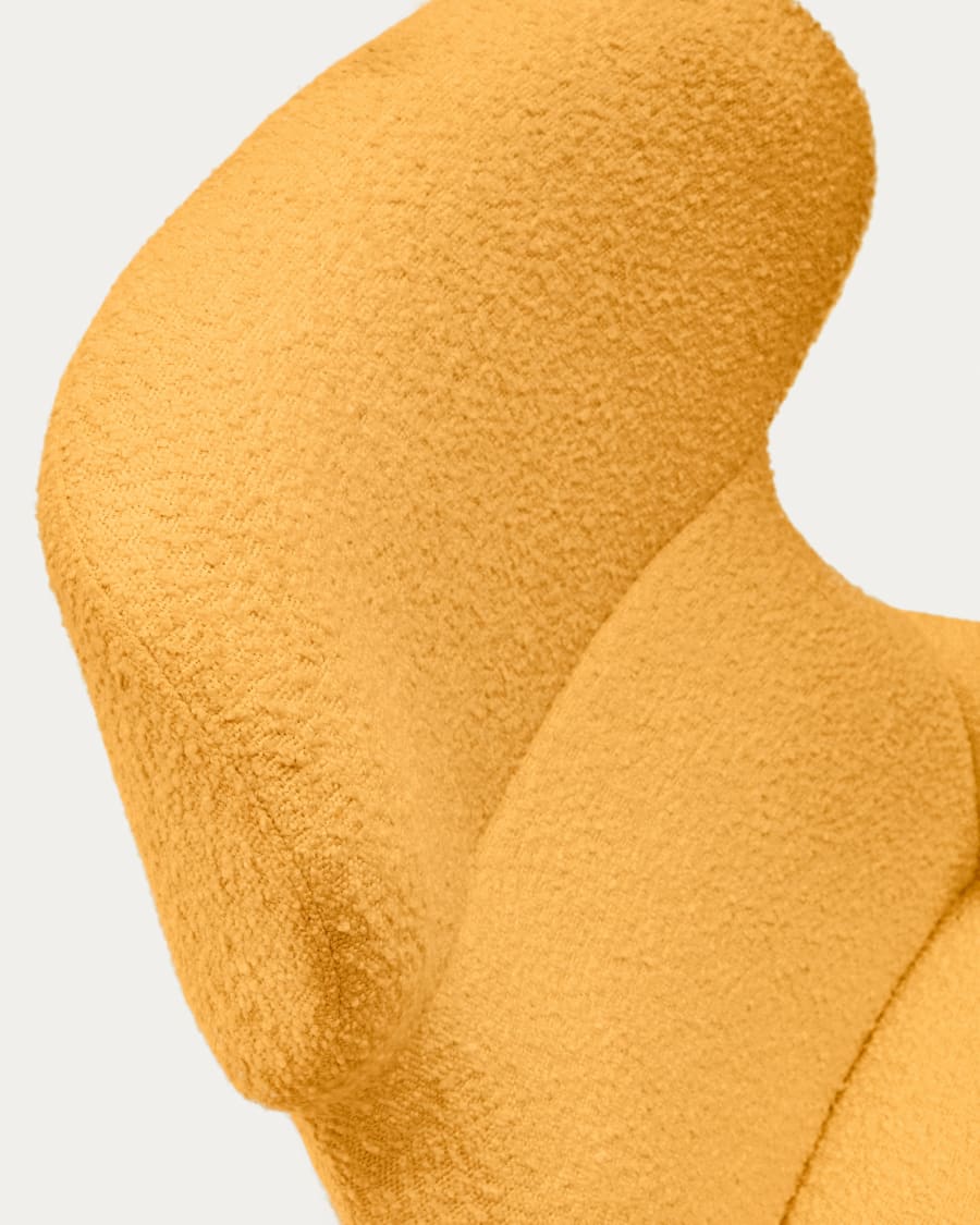 Belina armchair in mustard bouclé and steel with black finish FSC 100%