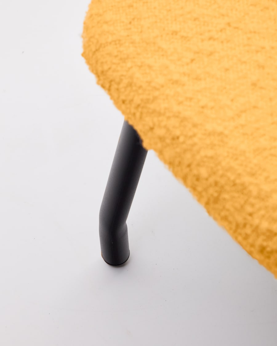 Belina footrest in mustard bouclé and steel with black finish FSC 100%