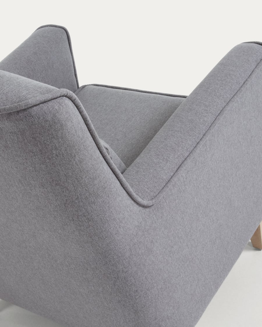 Glam light grey armchair with solid beech wood legs.