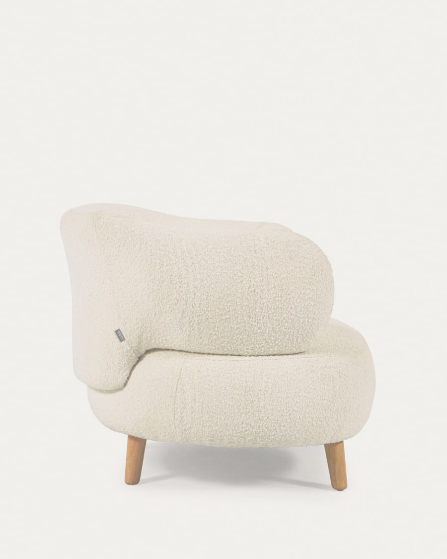 Luisa white bouclé armchair with solid rubber wood legs.