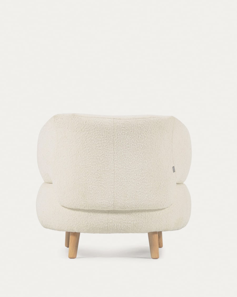 Luisa white bouclé armchair with solid rubber wood legs.