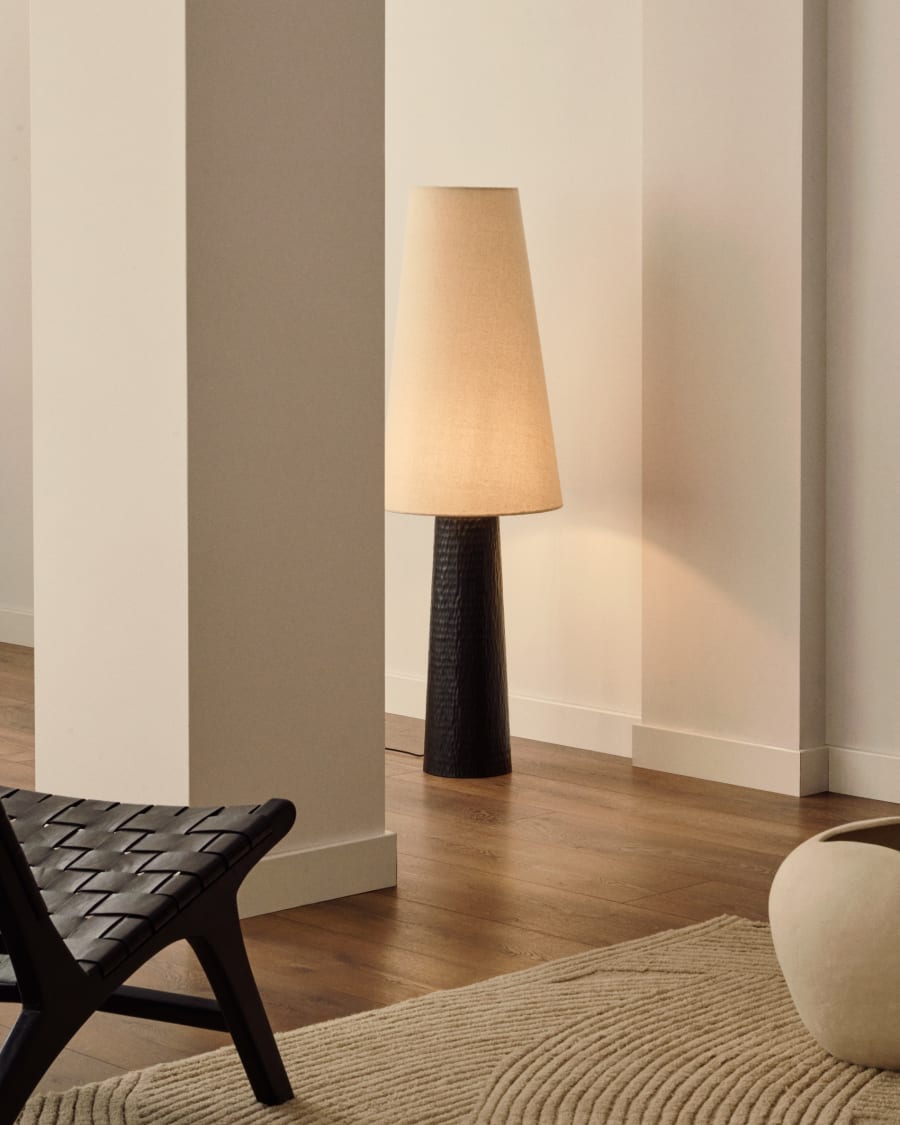 Senni floor lamp with a metal base in a black painted finish Australia adaptor
