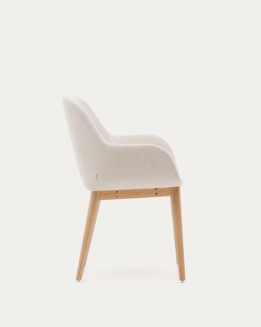 Konna chair in beige with solid ash wood legs in a natural finish