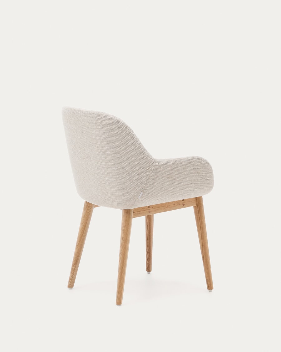 Konna chair in beige with solid ash wood legs in a natural finish