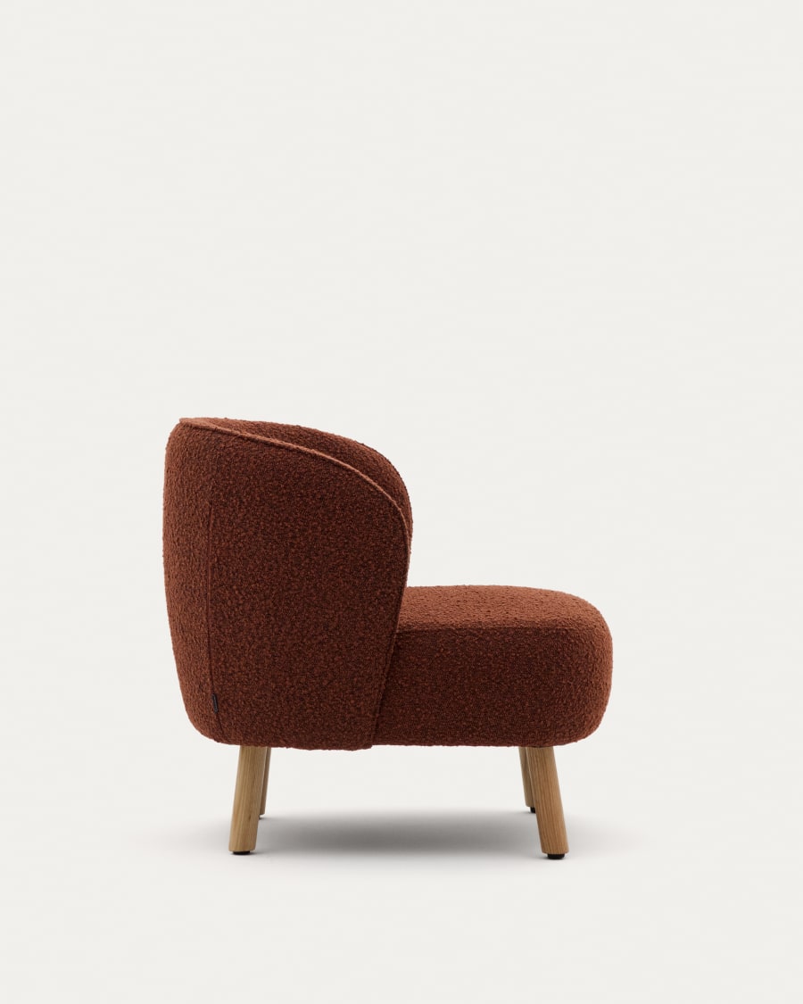 Ulit armchair in terracotta bouclé with solid beech wood legs in a natural finish