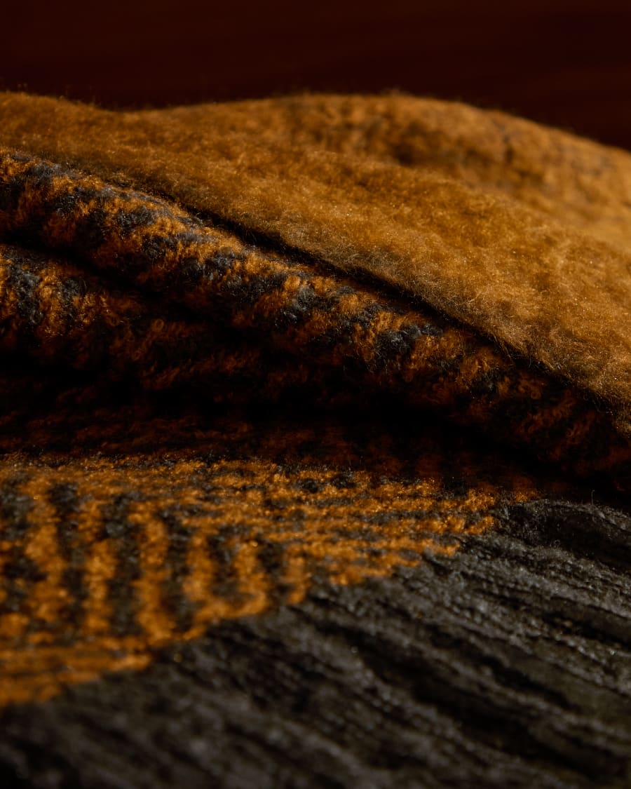 Nidur blanket in a mustard and grey wool blend, 130 x 170 cm
