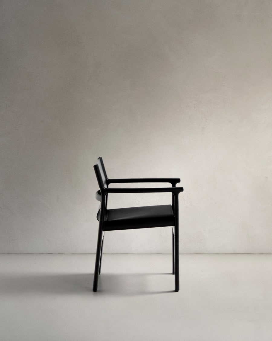 Jan chair made of black recycled leather fibres and FSC 100% solid ash wood with black finish