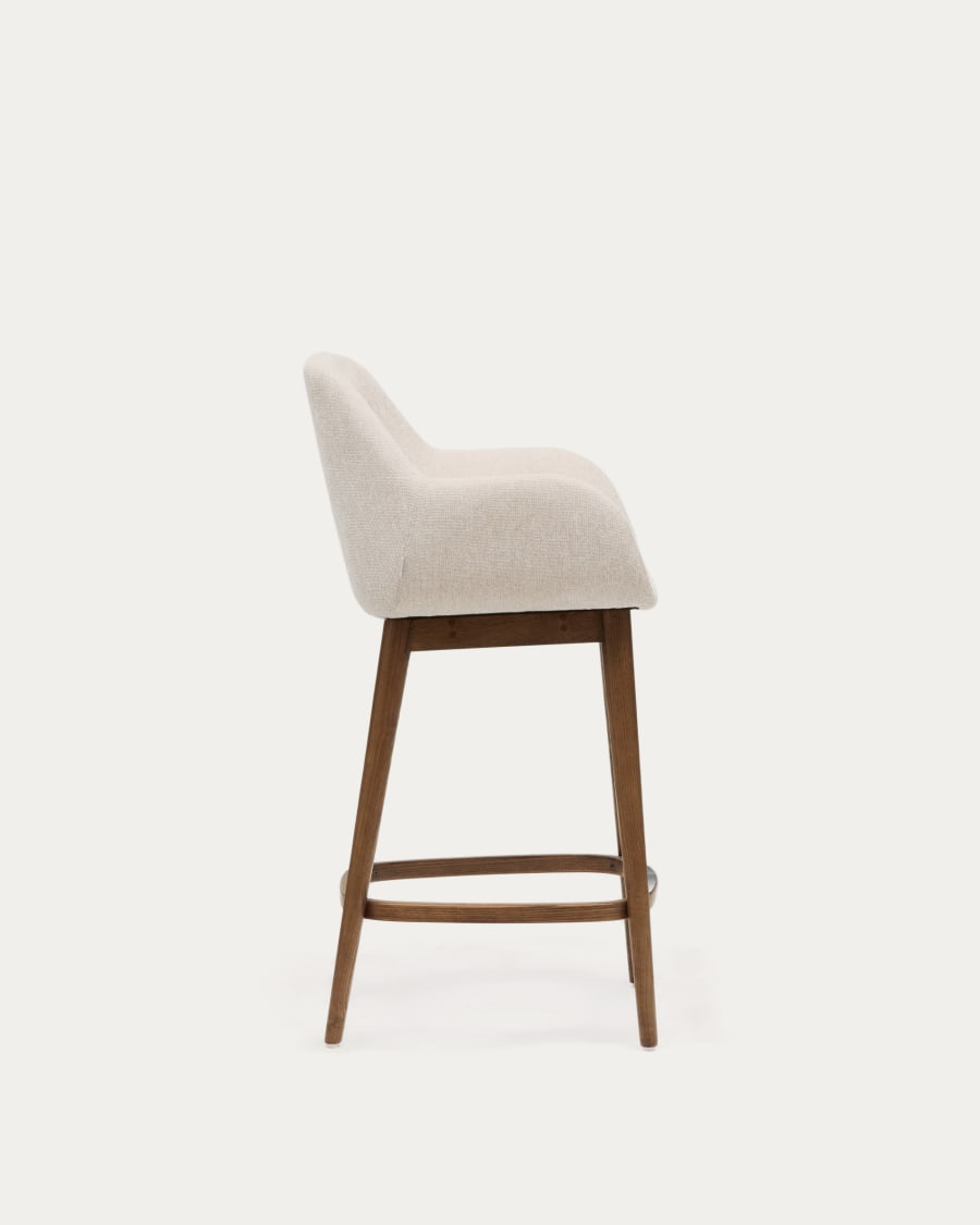Konna stool in beige and solid ash wood legs in a dark finish, 65 cm